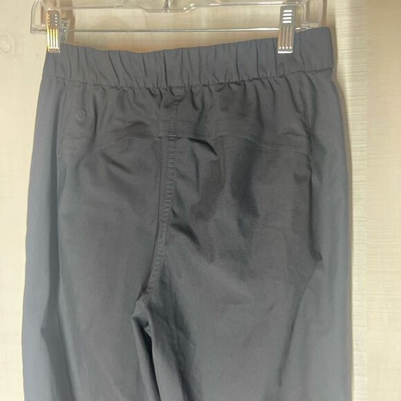 Lululemon Warpstreme high rise 7/8 jogger‎ black button front pockets, size 28 - Picture 8 of 15